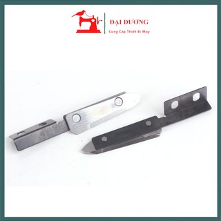 Dao gạt vải dưới máy cắt vải đầu bàn