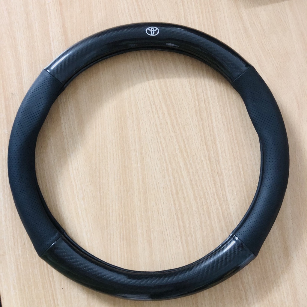 Bọc vô lăng Toyota Vios, Innova, Fortuner, Camry, Altis, Yaris, Land Cruise, Hilux, Avalon, Trùm vô lăng cacbon bảo vệ