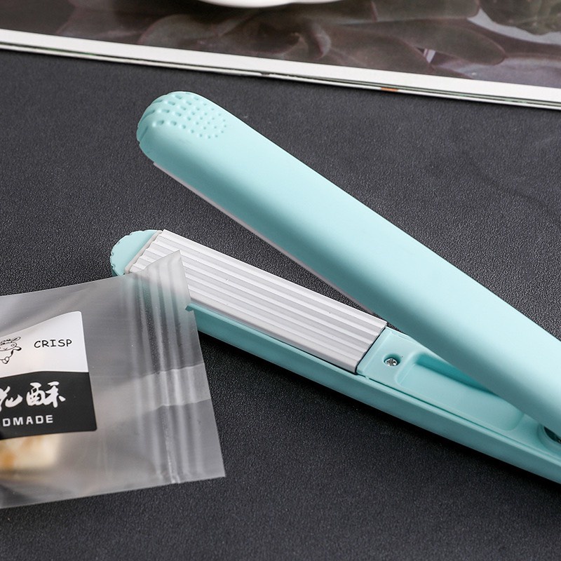 TD64-Máy hàn miệng túi cầm tay mini