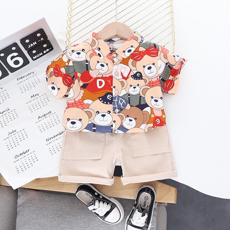 Mùa hè mới nam nữ trẻ em dễ thương in đầy đủ phim hoạt hình gấu con cotton tay áo ngắn + bộ quần short thời trang giản d