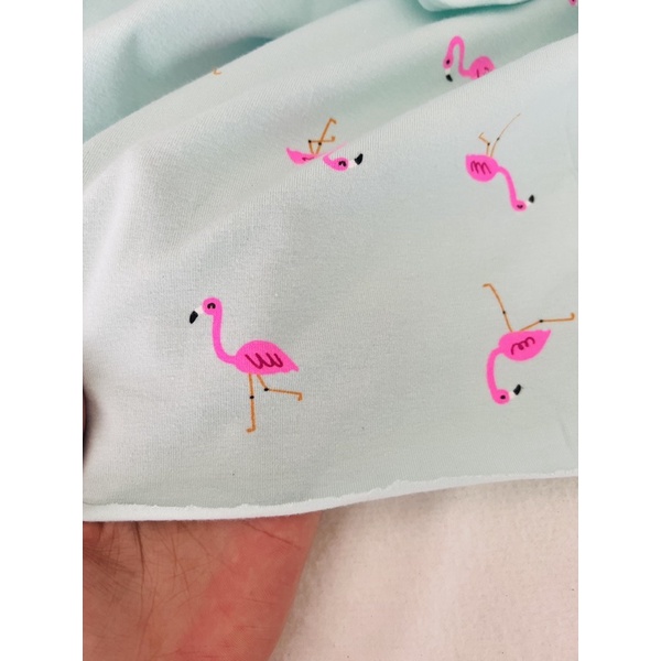 Vải thun cotton 4c hình hạc nền xanh mint