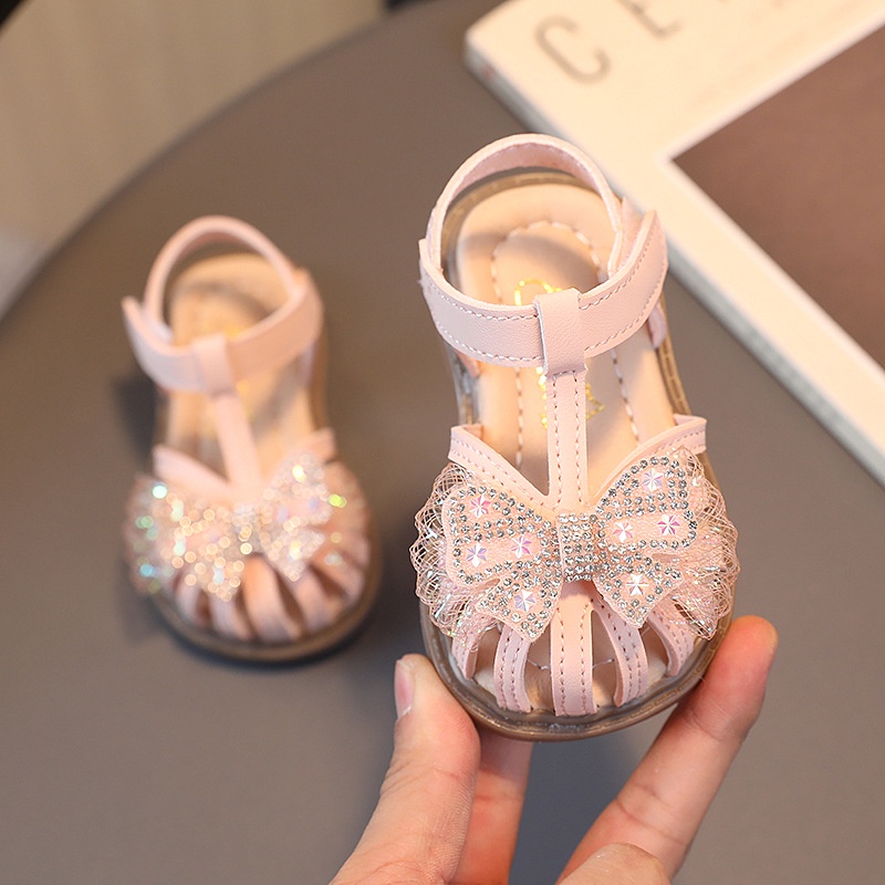 XINH QUÁ_ Dép Rọ tập đi đính nơ kim tuyến lên chân tuyệt đẹp cho bé gái size 15-25