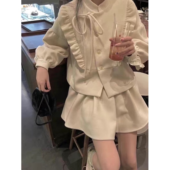 Bộ áo babydoll và chân váy xếp li dáng xoè