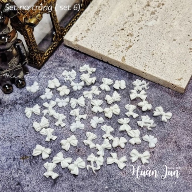 Cham nơ bột đen trắng mix đủ mẫu siêu HOT
