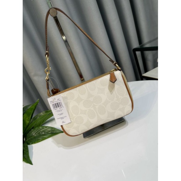 Túi Coac*h Nolita 19 kẹp nách sang trọng