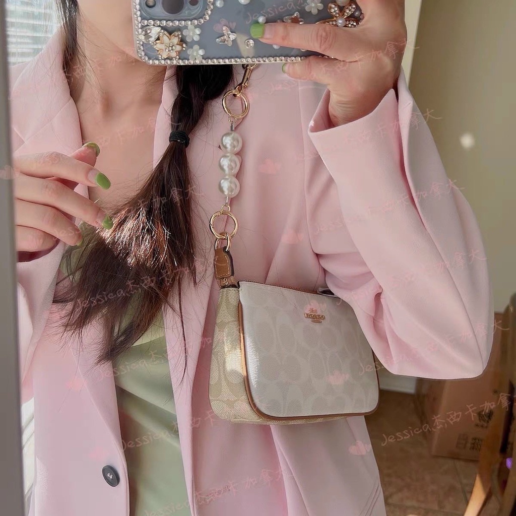 Túi đeo vai Coach dáng thuyền full hộp bill hãng