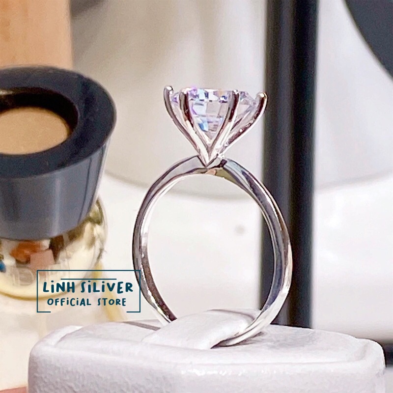 Nhẫn nữ đính đá chủ to 6ly bạc ta