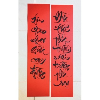 căp đối gia tiên thư pháp( viết trên giấy liễng)