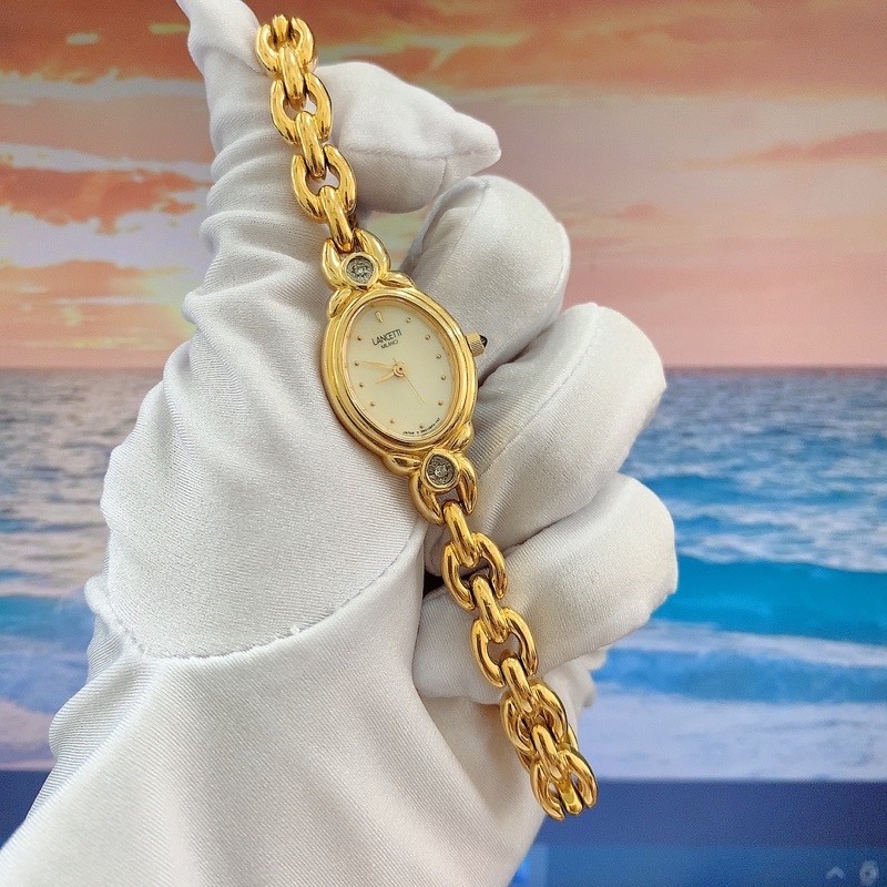 Đồng hồ si nữ hiệu Lancetti Milano, máy Nhật dáng lắc vàng, đính đá