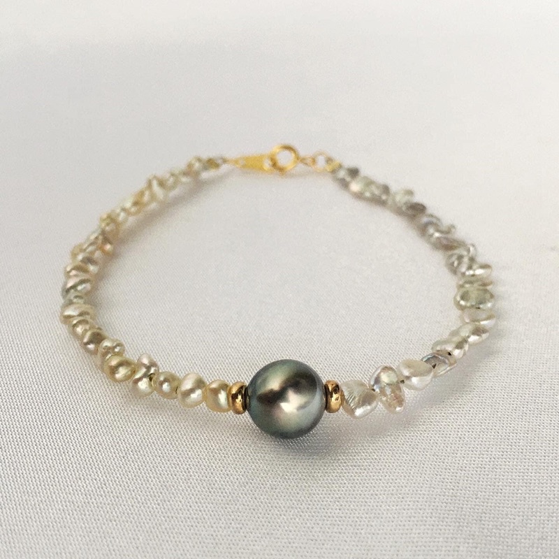 Vòng tay hạt dị 6ly mix màu đen