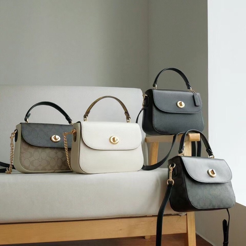 Túi Coach nắp gập