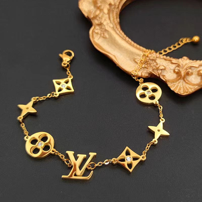Vòng Đeo Tay Bằng Thép Titan Mạ Vàng 18K Đính Đá Cao Cấp Thời Trang Cho Nữ