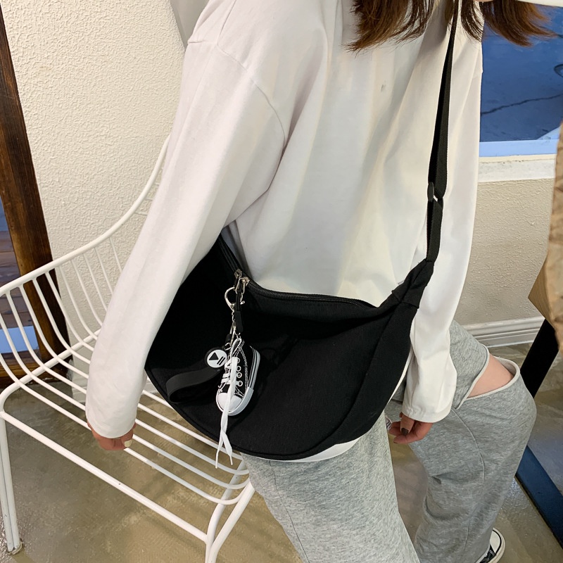 Túi Vải Đeo Chéo Màu Trơn Phong Cách Harajuku Thời Trang Hàn Quốc Dành Cho Nam Nữ