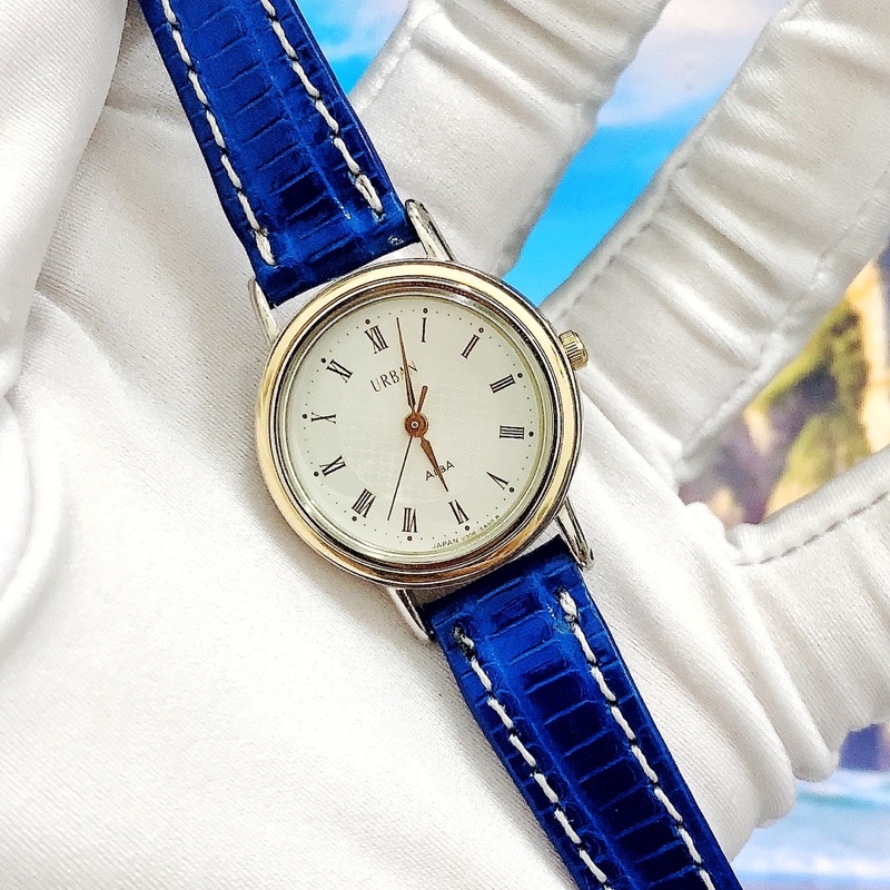 Đồng hồ nữ si hiệu Alba, mặt tròn dây da, cọc số la mã