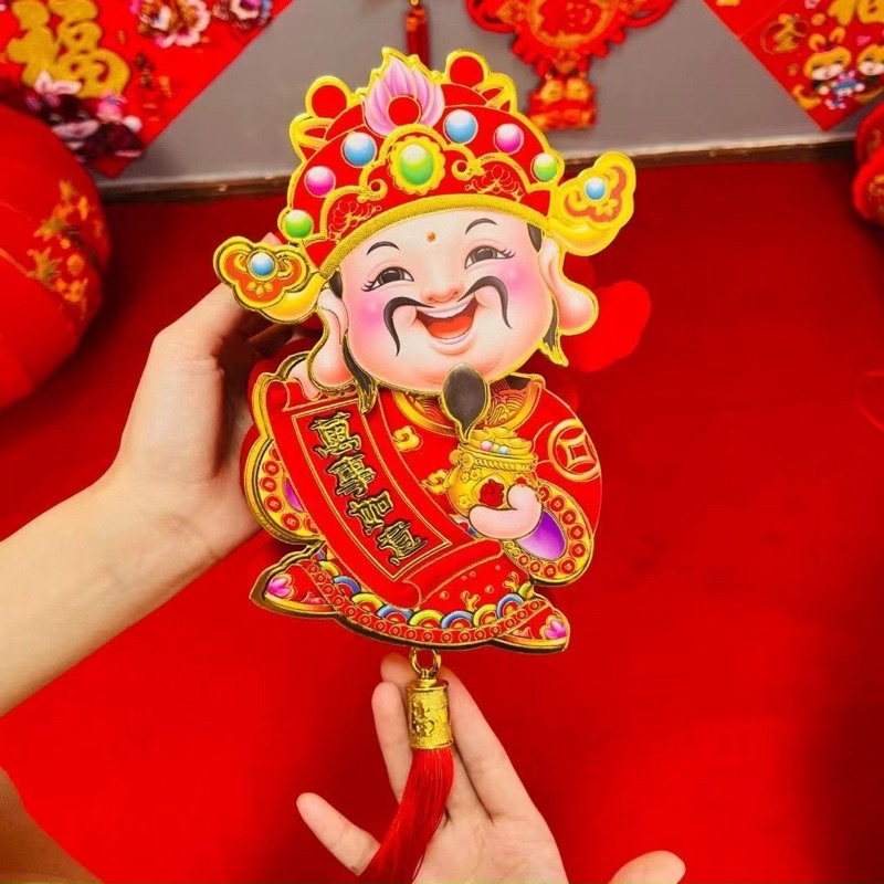 ông thần tài lúc lắc