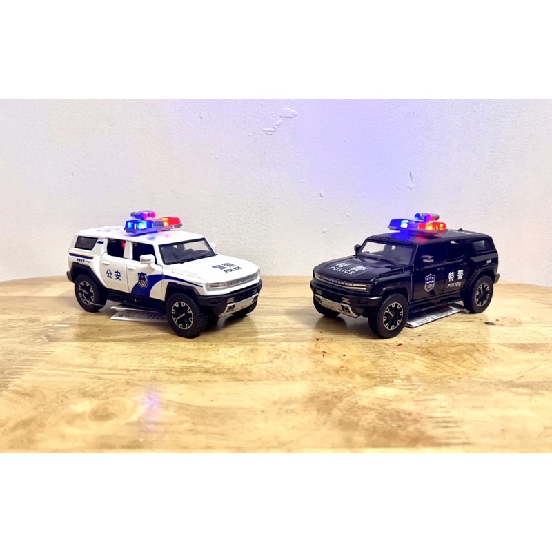 Mô hình xe cảnh sát GMC Hummer EV _ Tỷ lệ 1:32