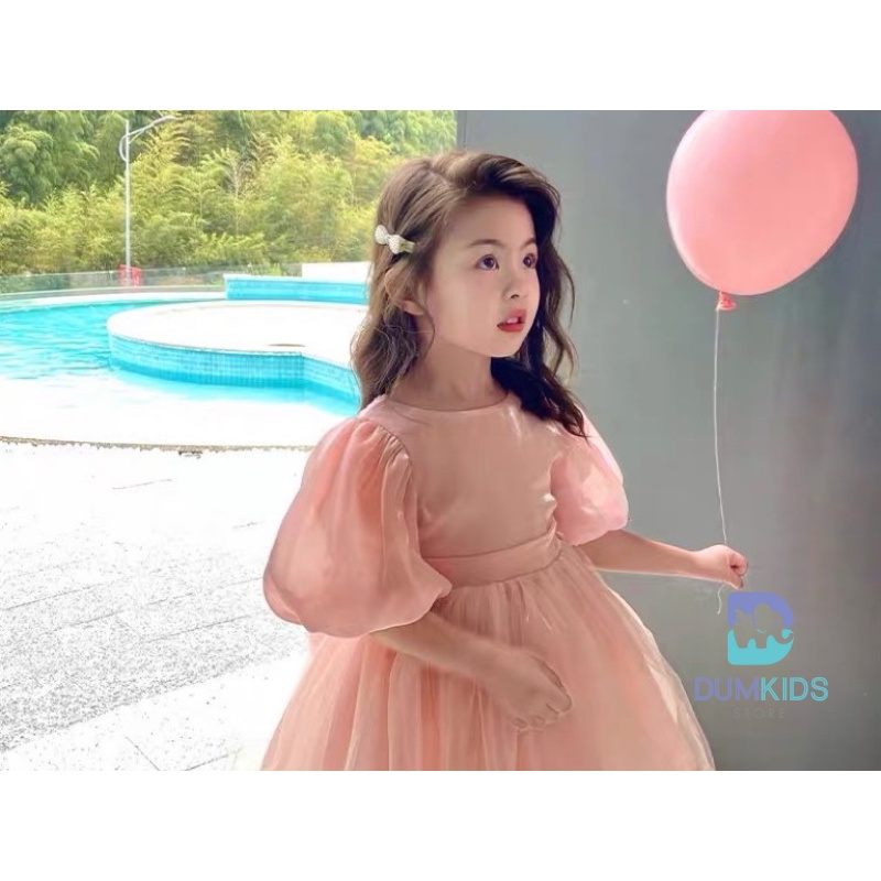 Đầm công chúa , váy bé gái chất tơ hồng óng ánh,thân sau có nơ chạy ngọc cực xinh cho bé.