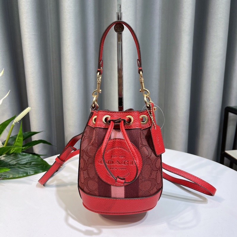 Túi xách tay C0ach bucket màu đỏ đô