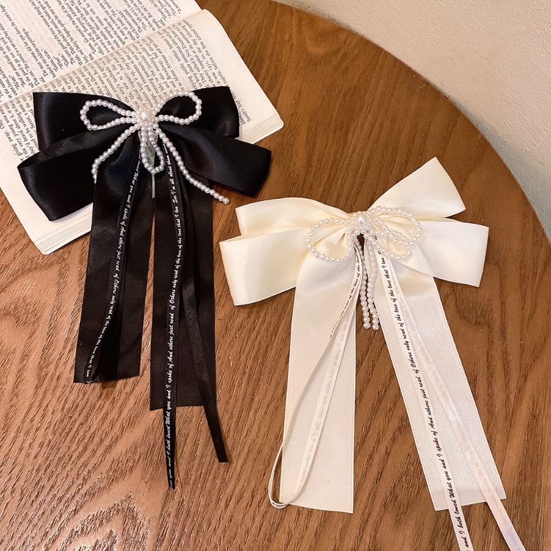 Kẹp Tóc Hình Nơ Đính Ngọc Trai Giả Thời Trang Hàn Quốc Cho Nữ