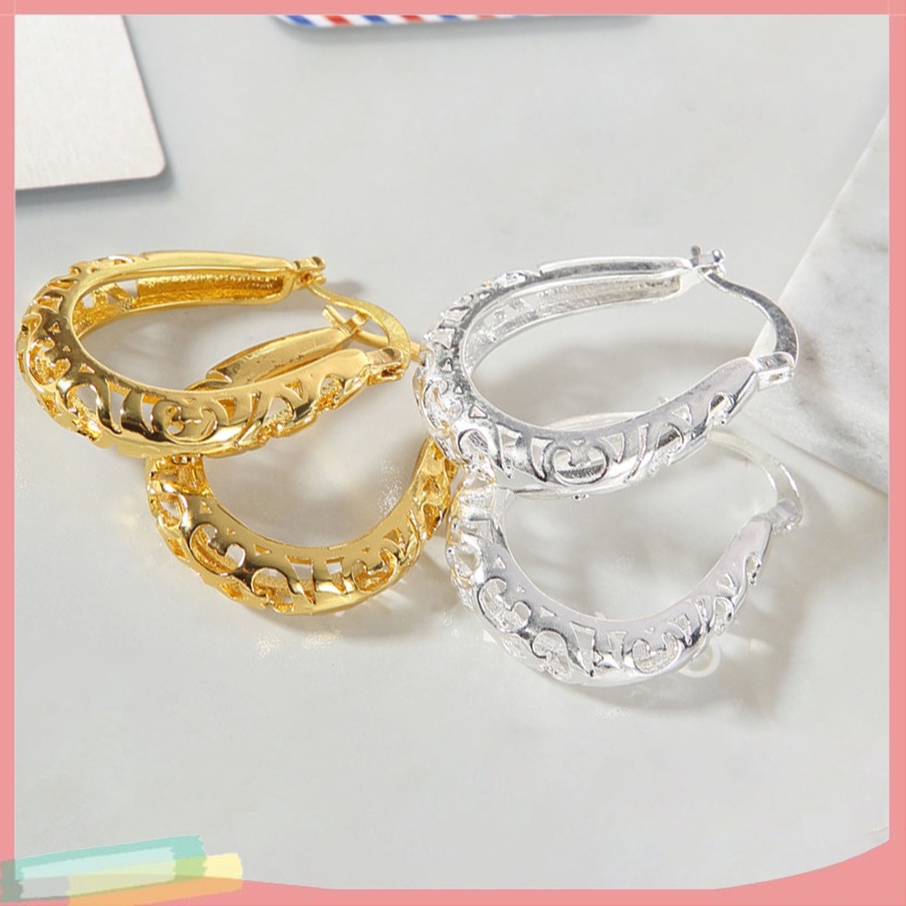 1 đôi khuyên tai hình tròn phối hoa rỗng thời trang cho nữ