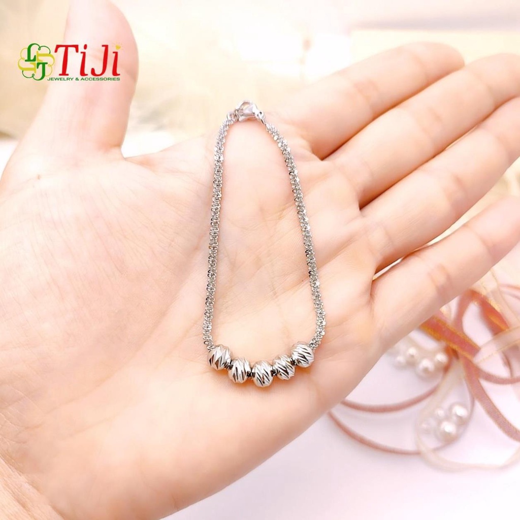 Lắc tay nữ inox kiểu xoắn xỏ bi chạm chiếu sáng đẹp không đen không gỉ sét