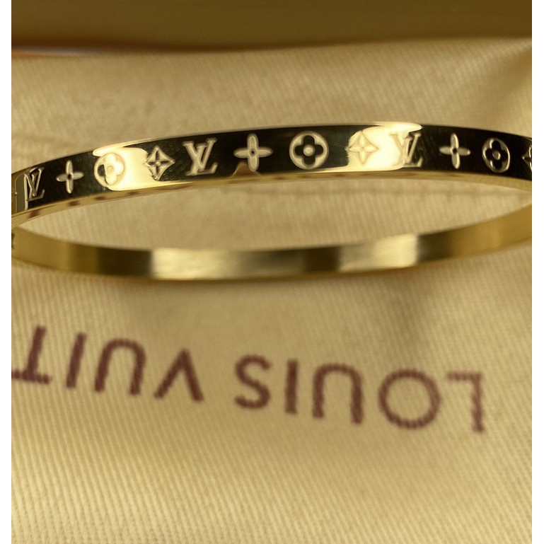 Vòng Tay titan lắc tay LV Kim Loại Khắc Họa Tiết Chữ Louis Vuitton Độc Đáo Thời Trang GUTADI