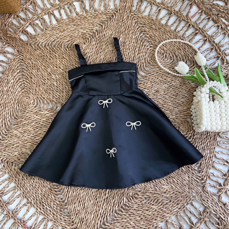 Váy đầm tacta 2 dây đính nơ cho bé gái 9-28kg