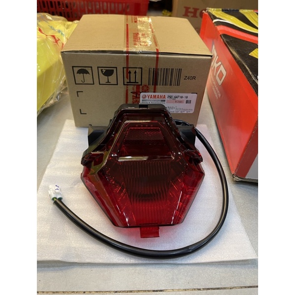 Đèn lái Ex150 zin hãng