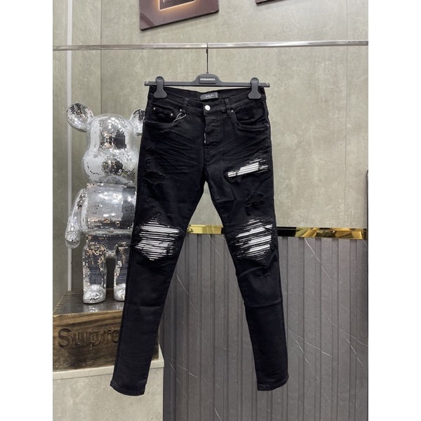 Quần jean skinny Amiri nam likeauth đen rách xước đùi gối vá da trắng ngôi sao 6 cánh ống nhăn sóng JSC08P