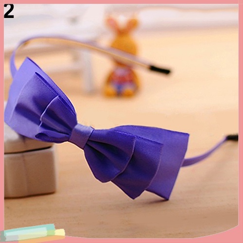 Băng đô cài tóc gắn nơ trang trí xinh xắn cho nữ