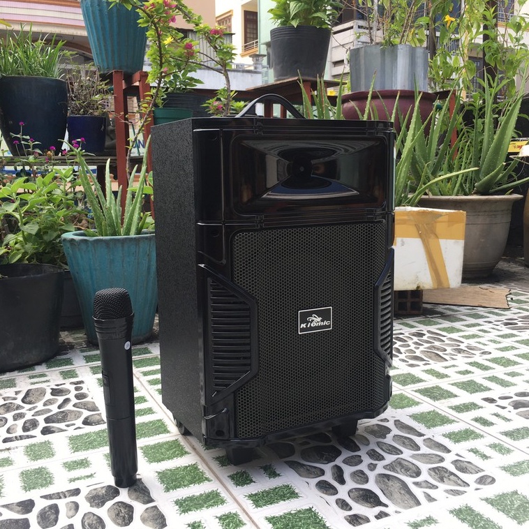 Loa Karaoke Bluetooth Kiomic K108 Di Động Vali Kéo Thùng Gỗ Tặng Kèm 1 MIcro Không Dây