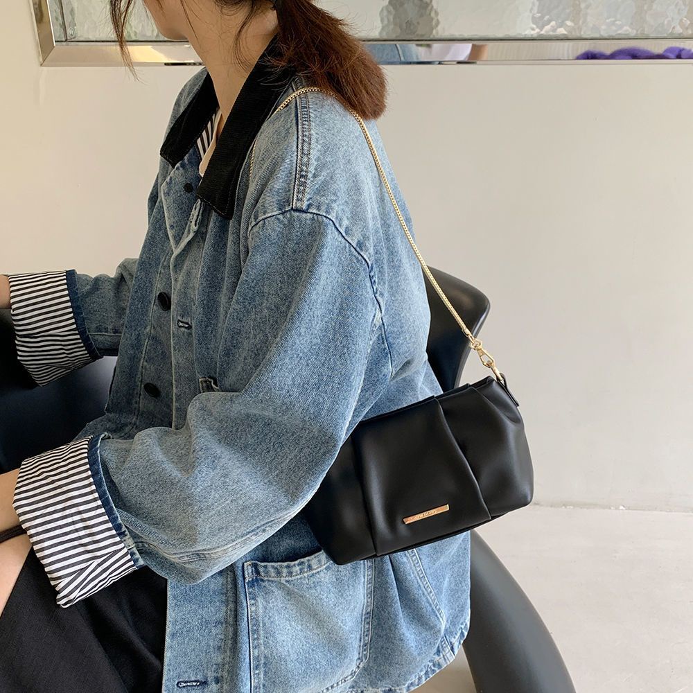 Túi Xách Đeo Vai Phong Cách Niche Thiết Kế Mới Cao Cấp Kết Cấu Bánh Bao Có Dây Xích Dành Cho Bạn Nữ