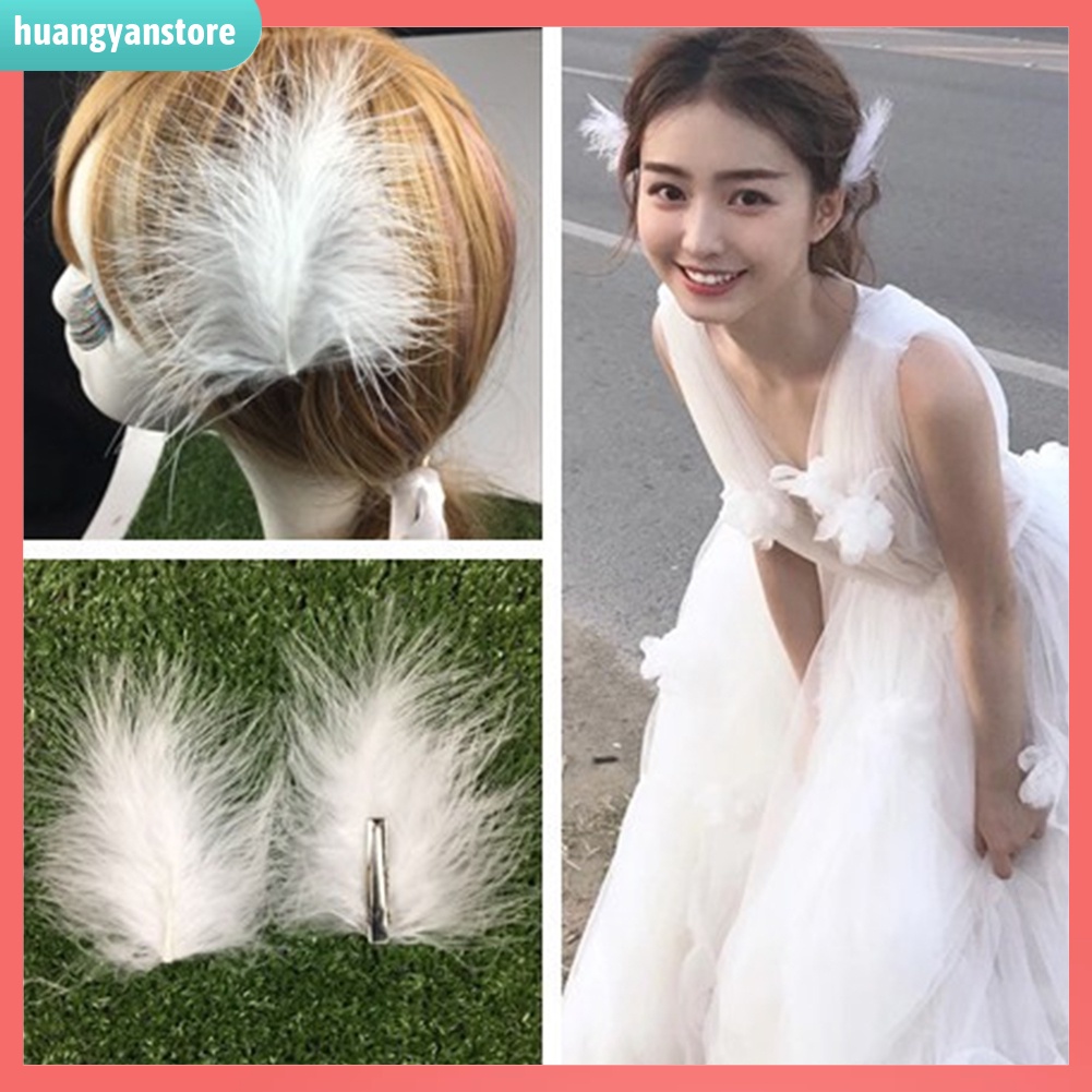 HY/ 2 kẹp tóc lông vũ đính đá và ngọc trai giả
