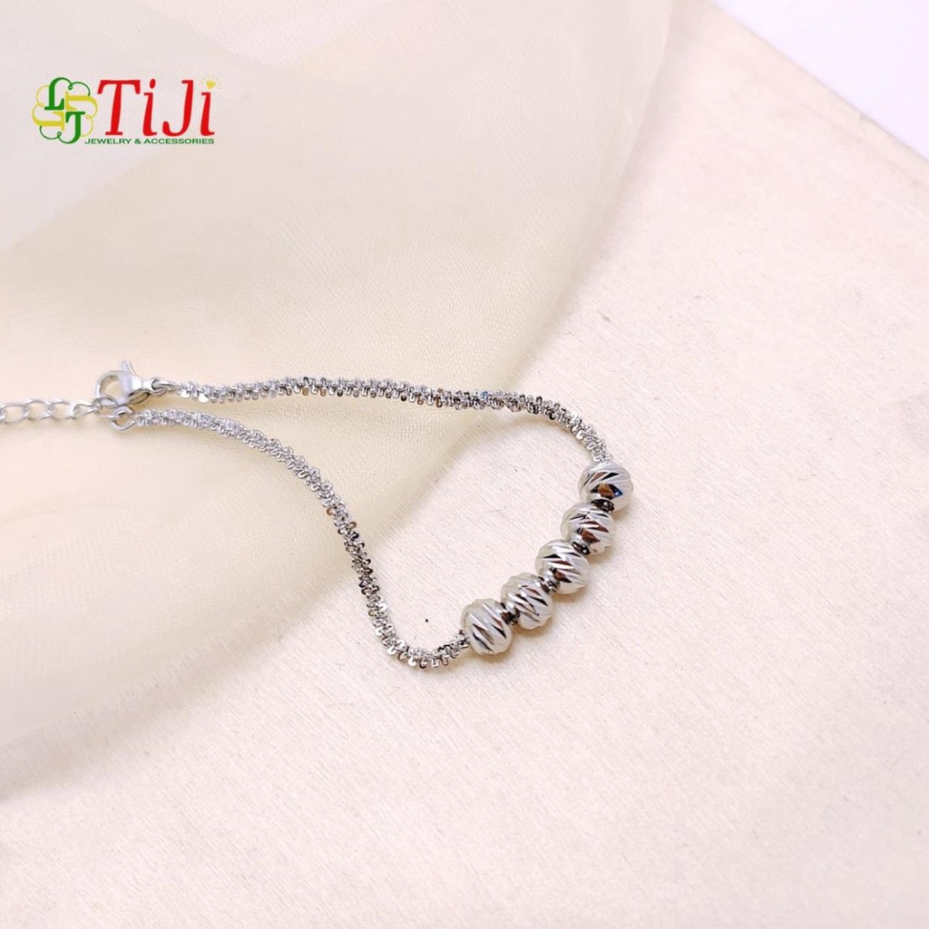 Lắc tay nữ inox kiểu xoắn xỏ bi chạm chiếu sáng đẹp không đen không gỉ sét