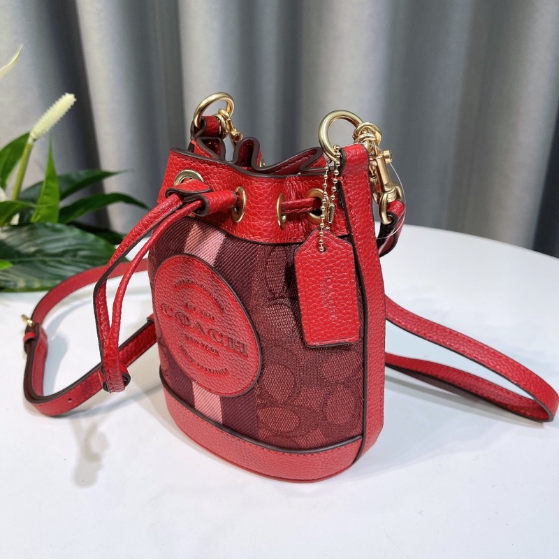 Túi xách tay C0ach bucket màu đỏ đô
