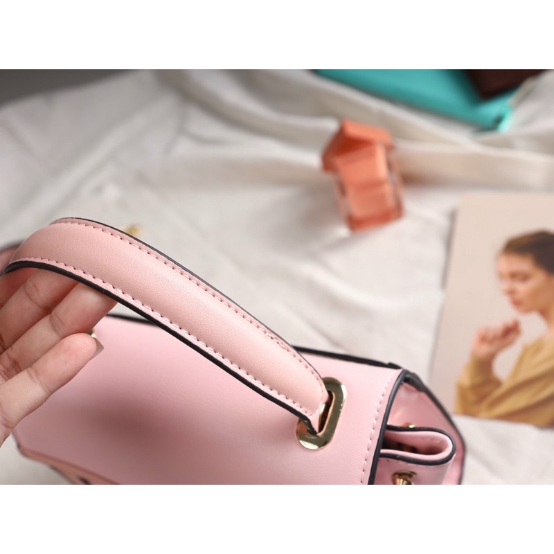 Túi xách MK Whitney mini Satchel màu hồng nhạt