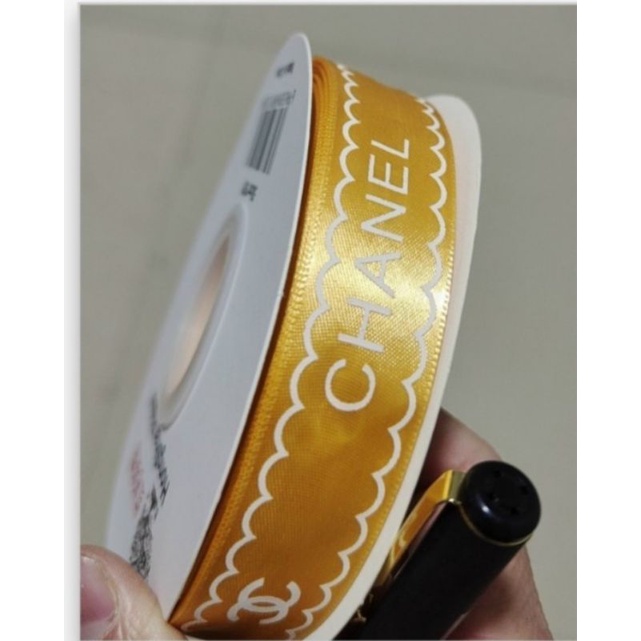 1 cuộn ruybang lụa in chữ2,5 cm