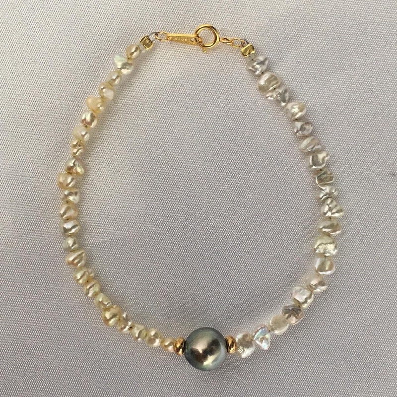 Vòng tay hạt dị 6ly mix màu đen