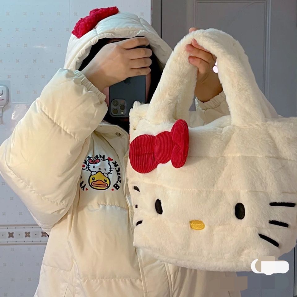 Túi Bông Giữ Ấm Tay Họa Tiết Hello Kitty Đính Nơ Bướm Sức Chứa Lớn Thời Trang Thu Đông Cho Nữ
