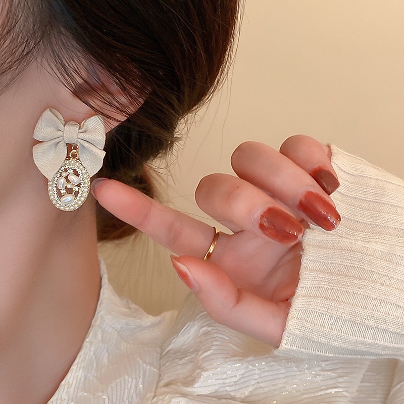 Bông Tai Dáng Dài Đính Nơ Và Ngọc Trai Thời Trang Cho Nữ