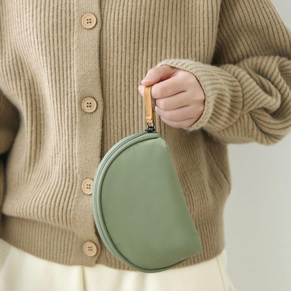 Túi Đựng Mỹ Phẩm Hình Bán Nguyệt Có Khóa Kéo Màu Kem Dễ Thương