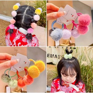 Set 2 dây cột tóc đính cục bông màu kẹo cho bé