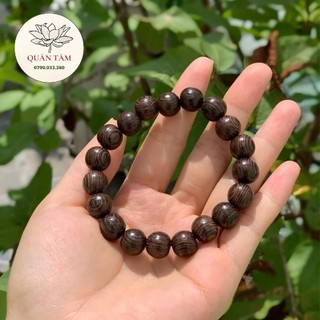 Vòng tay chuỗi gỗ mun đuôi công phong thủy 8 ly