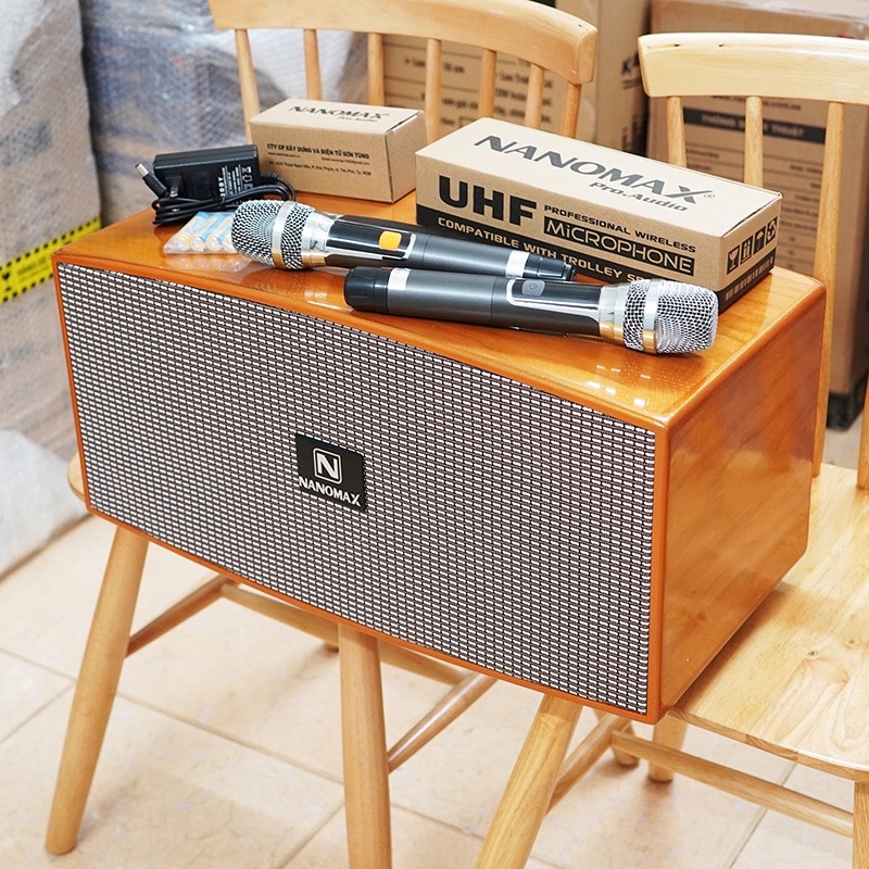 Loa Karaoke xách tay Nanomax X-320 ( Loa 2 đường tiếng, 2 lao bass 20cm, 2 loa treble, công suất đạt 650W, 2 Micro UHF)