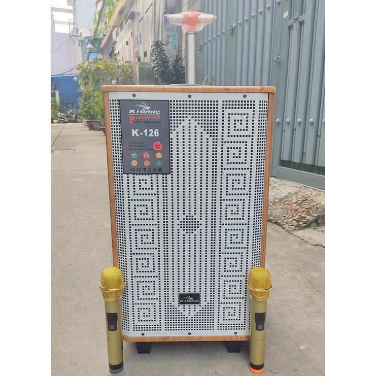 Loa karaoke di dộng kéo vali kiomic K126 thùng gỗ 3 tấc công suất 400w kèm 2 mic không dây bảo hành 12 tháng