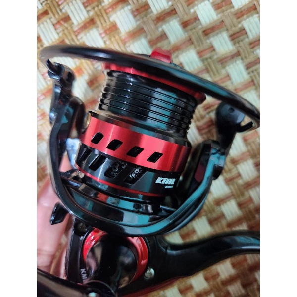 Máy câu lure cối nông size 1000, cối kim loại và tay quay kim loại