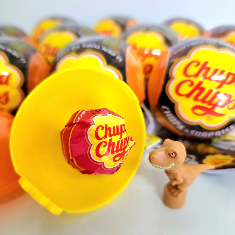 Kẹo Mút Kèm Đồ Chơi Khủng Long Chupa Chups Surpirse Jurassic World 12gr - Tây Ban Nha