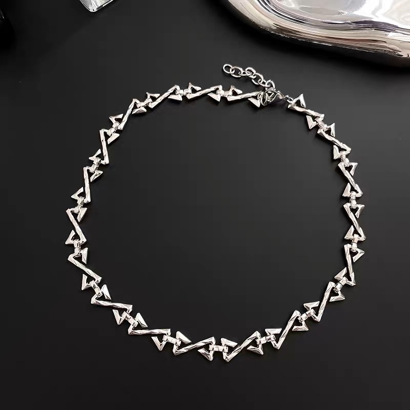 Dây chuyền thép titan dạng xương đan kiểu dáng hip hop unisex