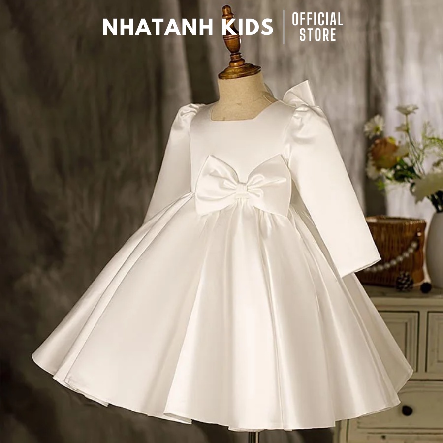 Đầm công chúa bé gái NHATANH KIDS màu trắng tay dài gắn nơ đằng sau cho bé từ 0-12 tuổi NA06