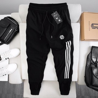 Quần thể thao nam jogger 3 sọc chân